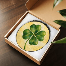 Load image into Gallery viewer, Lucky Charm glass suncatcher featuring a green four-leaf clover with beautifully layered brushwork against a soft golden-yellow background.