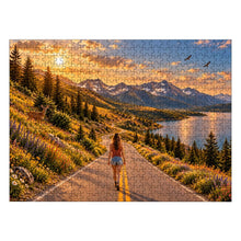 Cargar imagen en el visor de la galería, THE ROAD AHEAD 500 piece wooden jigsaw puzzle featuring a woman walking along a mountain road beside a blue lake with wildflowers, deer, birds, and snow capped peaks.