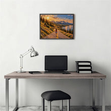 Carica l'immagine nel visualizzatore di Gallery, THE ROAD AHEAD 500 piece wooden jigsaw puzzle featuring a woman walking along a mountain road beside a blue lake with wildflowers, deer, birds, and snow capped peaks.
