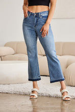 Load image into Gallery viewer, Judy Blue Distressed Released Hem Cropped Blue Denim Bootcut Jeans
