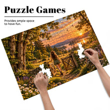 Cargar imagen en el visor de la galería, READY 500 piece puzzle featuring a woman walking through an open gate toward a glowing landscape with wildflowers, trees, deer, a rabbit, and birds.
