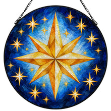 Загрузить изображение в средство просмотра галереи, Written in the Stars stained glass-style suncatcher featuring a golden eight-point star, smaller gold stars, deep blue painted background, and black hanging chain.
