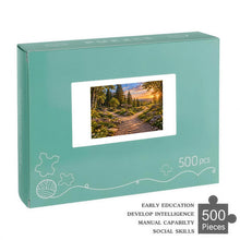 Загрузить изображение в средство просмотра галереи, TURNING POINT 500 piece wooden jigsaw puzzle featuring a KNOWN and UNKNOWN signpost at a forked forest path with wildflowers and sunset mountains.
