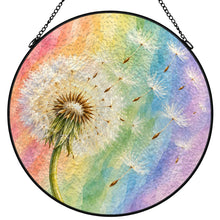 Carica l'immagine nel visualizzatore di Gallery, Wish Come True dandelion stained glass-style suncatcher featuring delicate white seeds drifting across pastel rainbow artwork, with a black metal frame and chain.
