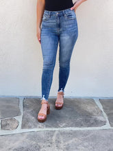 Load and play video in Gallery viewer, Kancan Lindsay High Rise Chewed Raw Hem Blue Denim Skinny Jeans
