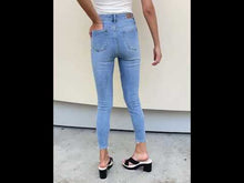 Load and play video in Gallery viewer, Judy Blue Keeley High Rise Button Fly Distressed Hem Blue Denim Skinny Jeans
