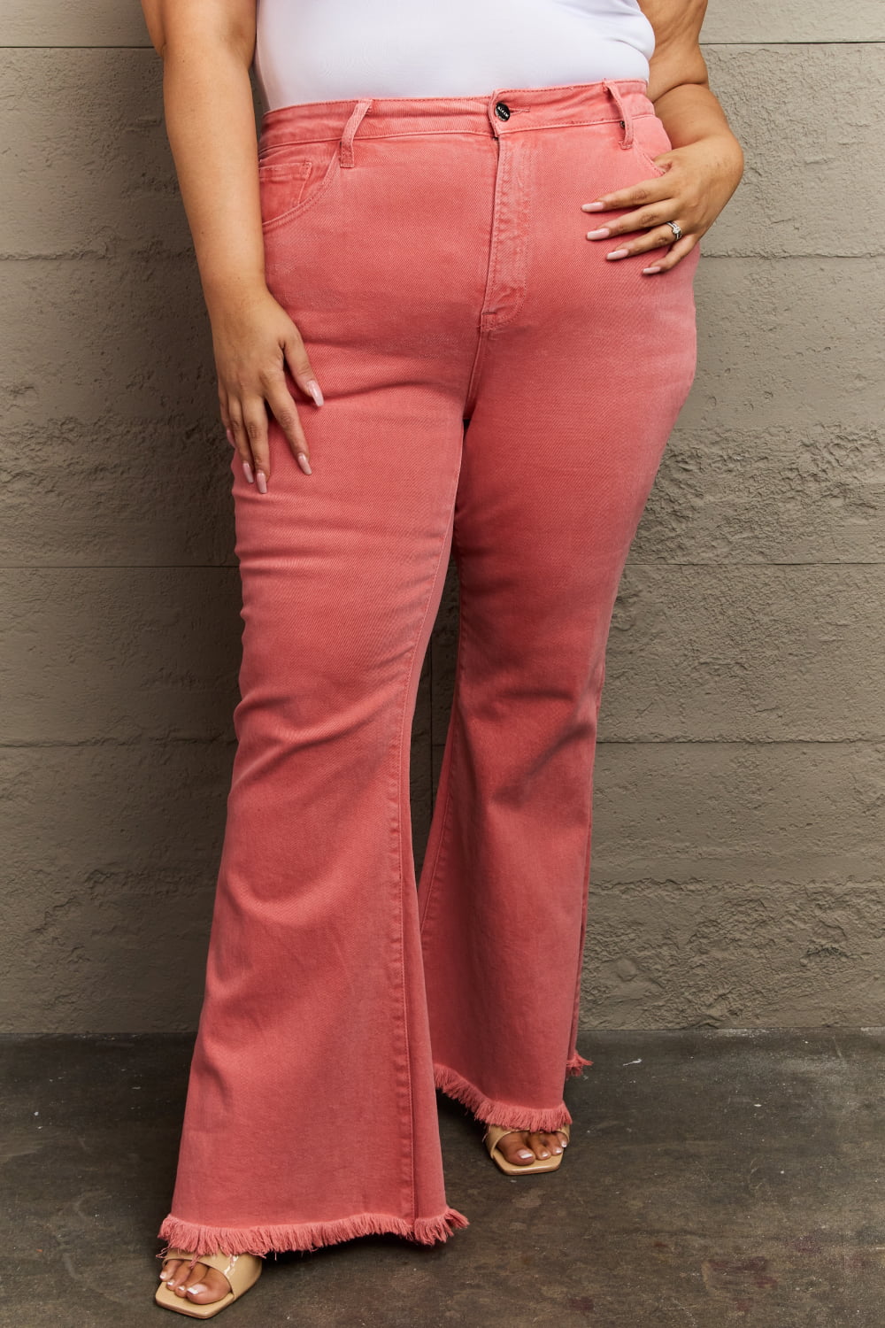 RISEN Bailey High Rise Raw Side Slit Hem Flared Leg Pink Denim Jeans