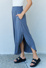 Cargar imagen en el visor de la galería, Ninexis Dusty Blue Smocked Waist Scoop Side Slit Curved Hem Maxi Skirt
