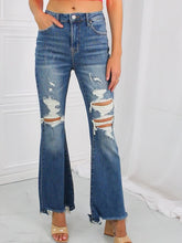 Load and play video in Gallery viewer, RISEN Hazel High Rise Distressed Chewed Raw Hem Flared Leg Blue Denim Jeans
